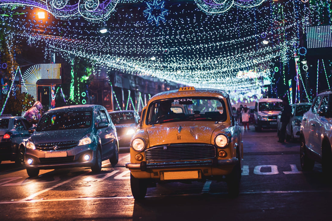 Cars on a city street at night