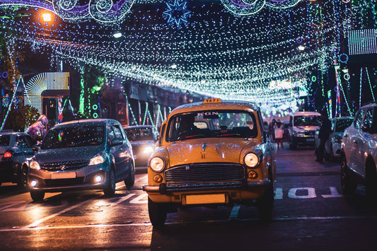 Cars on a city street at night
